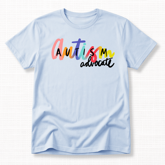 Light blue t-shirt with 'Autism advocate' text in colorful letters.